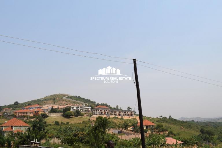 Land for sale in Kigo Kampala Uganda Spectrum Real Estate Solutions
