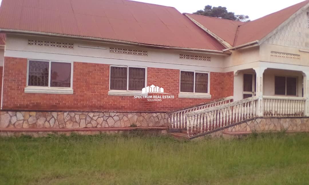 House for quick sale in Kigo Kampala