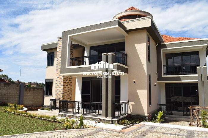 This storeyed house for sale in Akright Estate Bwebajja Entebbe road, Uganda