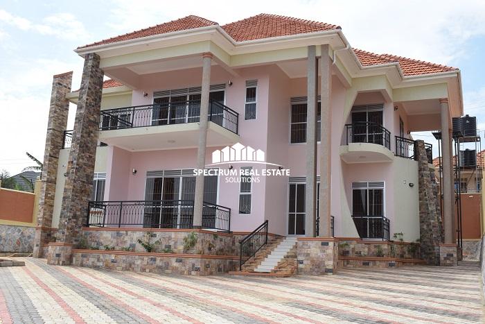 This newly built residential house for sale in Akright Estate Bwebajja Kampala Uganda