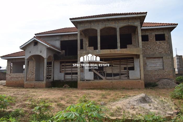 This unfurnished house for sale in Garuga Entebbe road near Pearl Marina