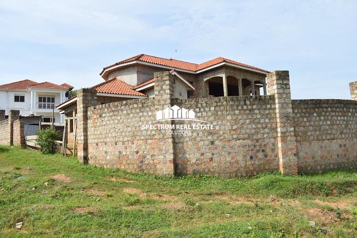 This unfurnished house for sale in Garuga Entebbe road near Pearl Marina