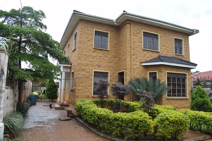 This unfinished house for sale on Entebbe road