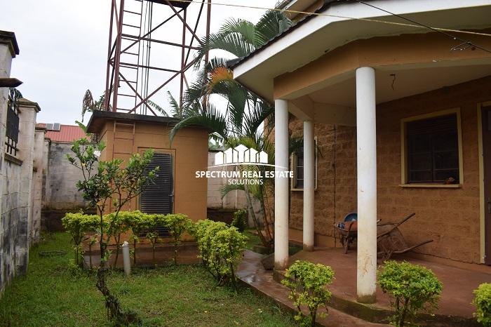 This unfinished house for sale on Entebbe road