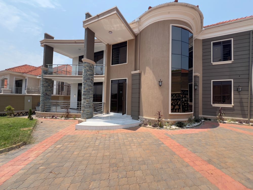 This 4 bedrooms storied house for sale in Akright Estate Bwebajja Entebbe road