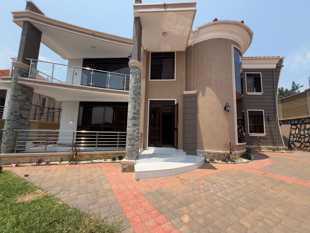 This 4 bedrooms storied house for sale in Akright Estate Bwebajja Entebbe road