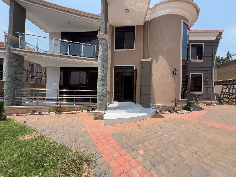 This 4 bedrooms storied house for sale in Akright Estate Bwebajja Entebbe road