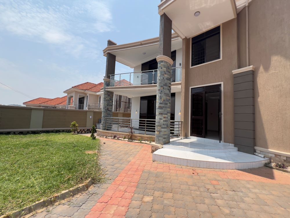 This 4 bedrooms storied house for sale in Akright Estate Bwebajja Entebbe road