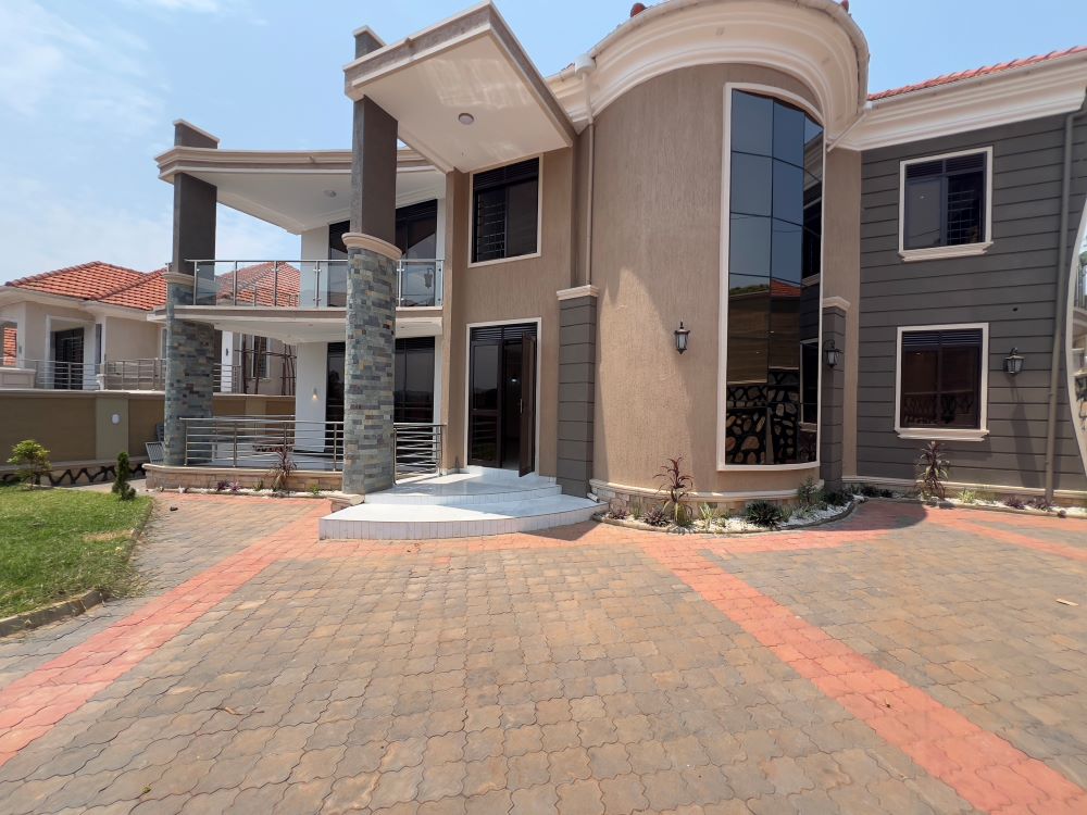 This 4 bedrooms storied house for sale in Akright Estate Bwebajja Entebbe road